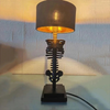 Lampe de table squelette à abat-jour noir
